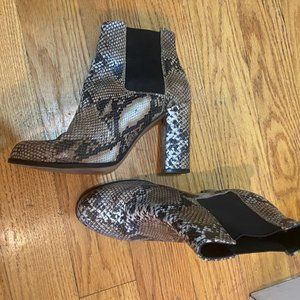 Snake skin high heeled booties